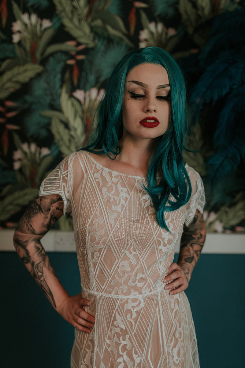 Bride wearing a pink slip dress under our Labyrinth lace wedding dress - Lookbook
