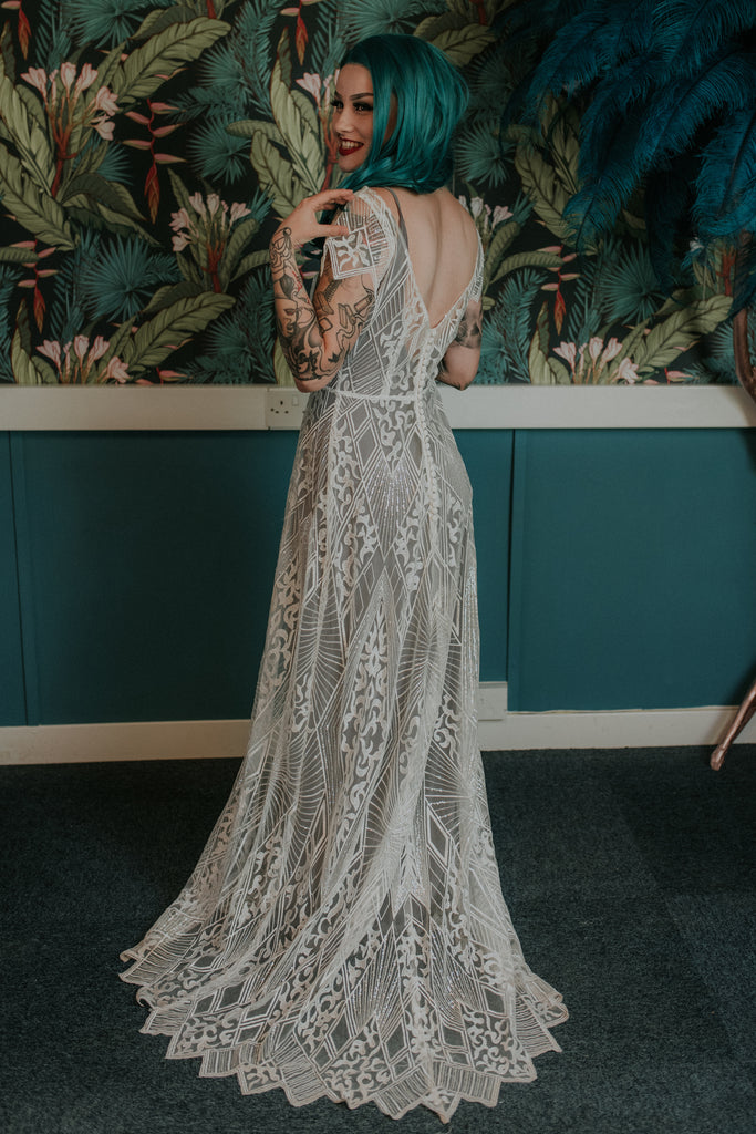 Bride wearing a wonderfully intricate lave wedding dress - Gallery