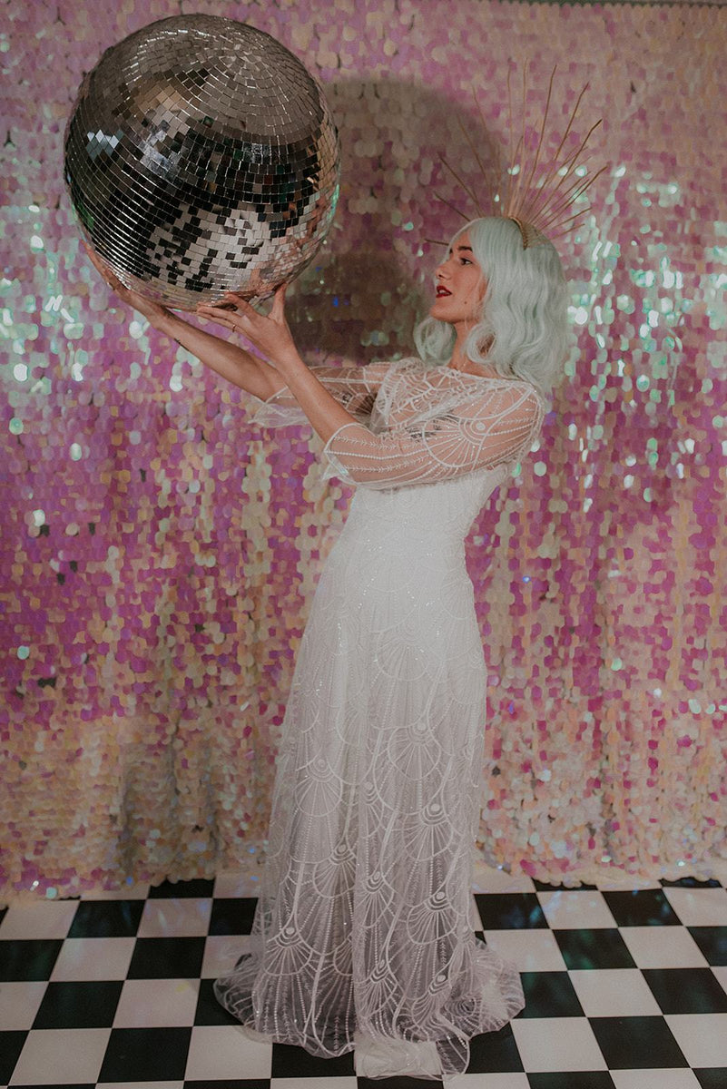 Bohemian bride holding a giant disco ball - Lookbook